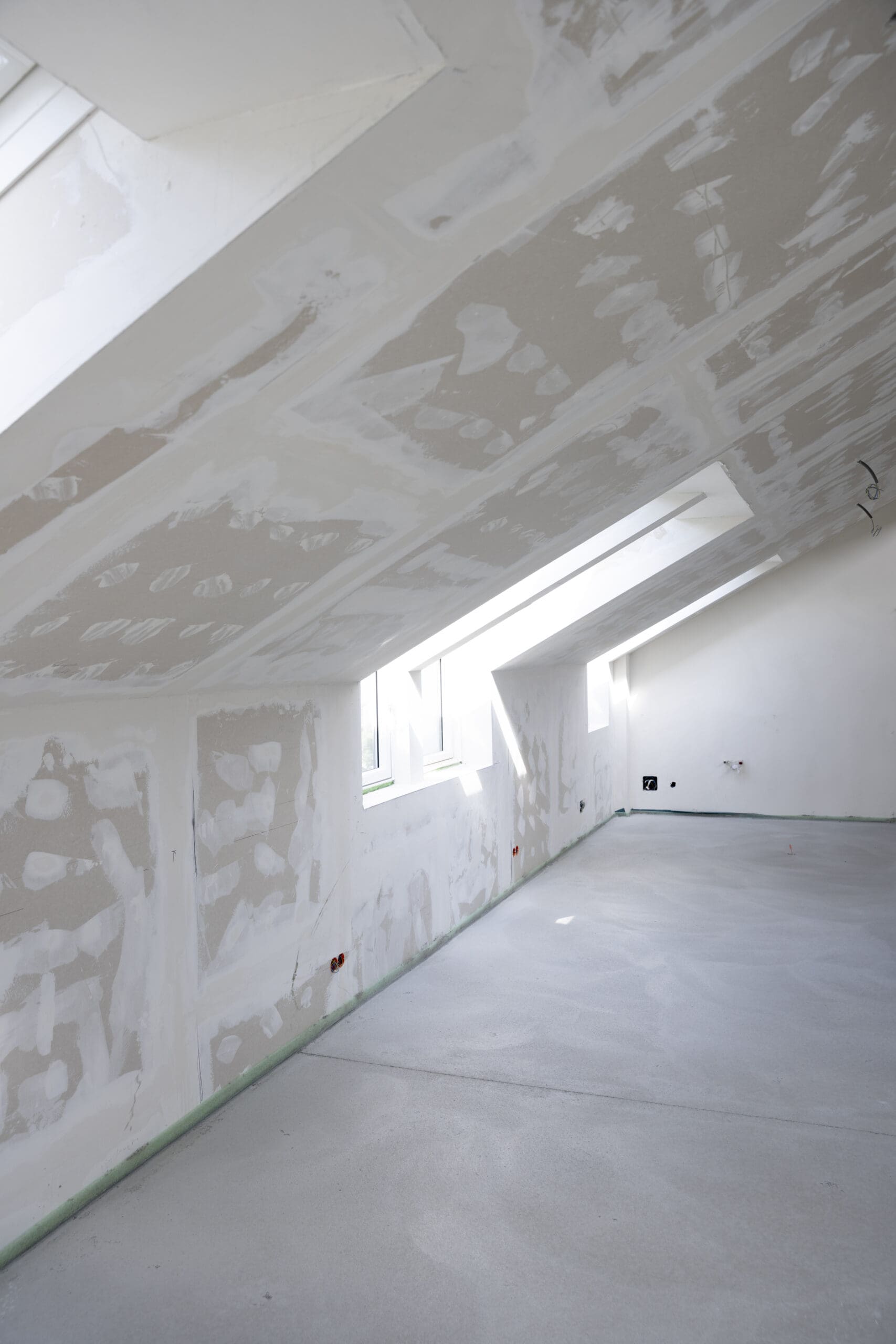 freshly cured concrete screed on construction site in family house