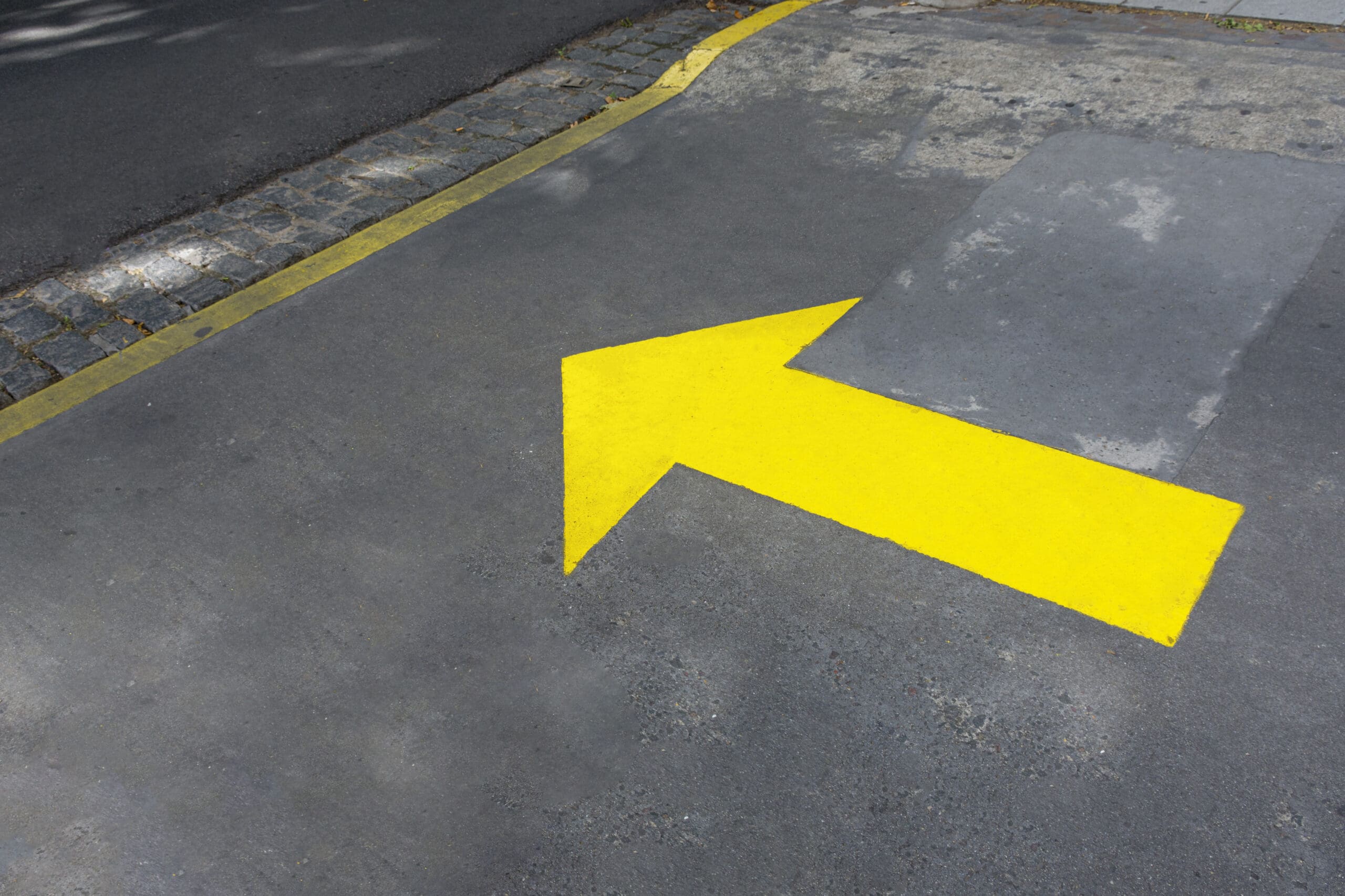 yellow-painted-arrow-streets
